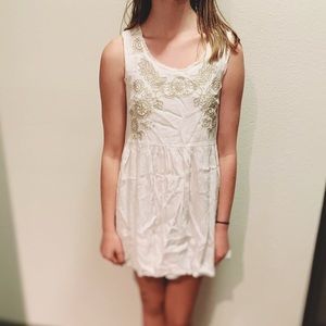 White Lulus dress that is perfect for graduation